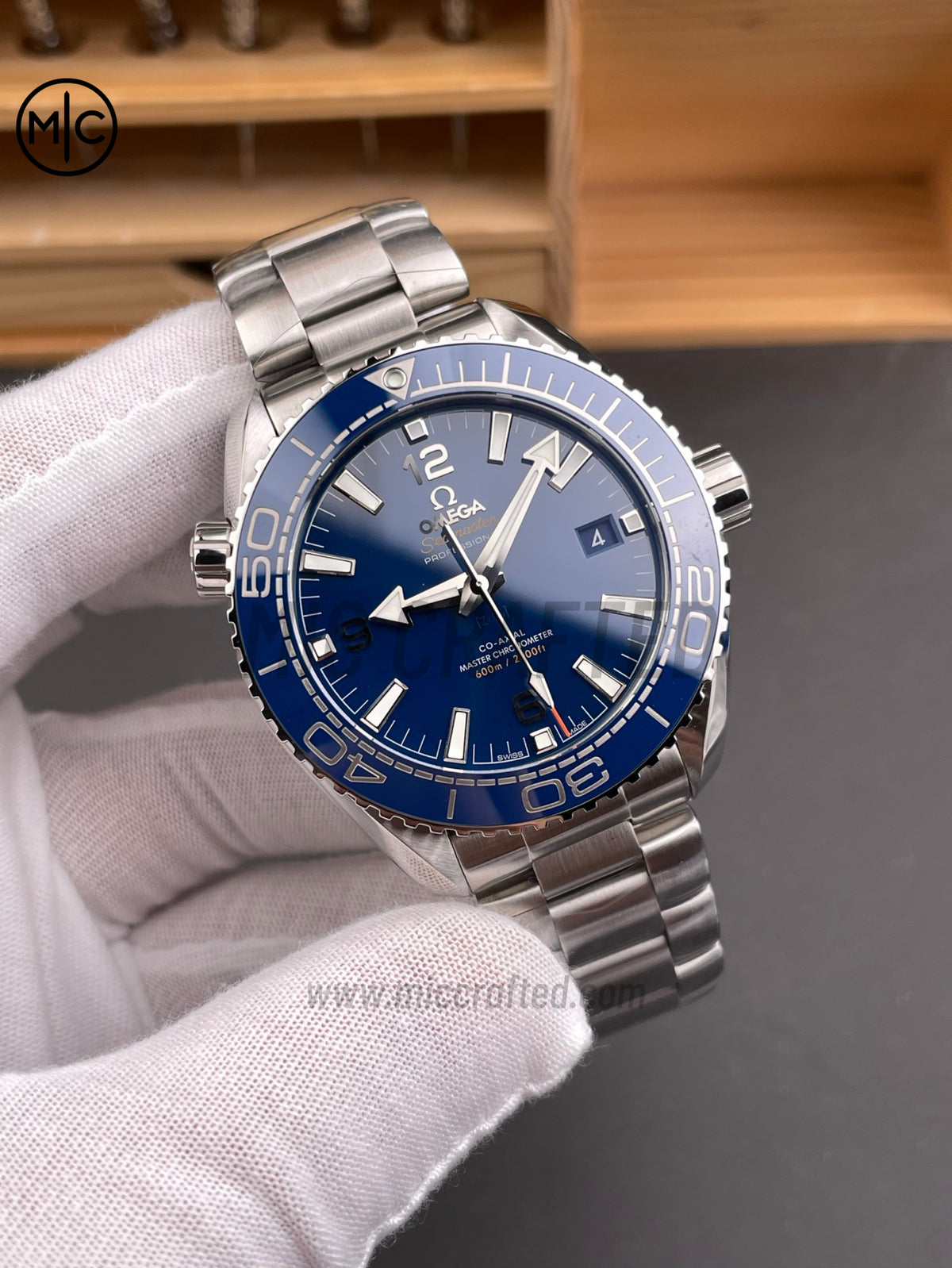Planet Ocean 600M 43.5 mm SS Blue Dial Blue Bezel on SS Bracelet – Premium Edition