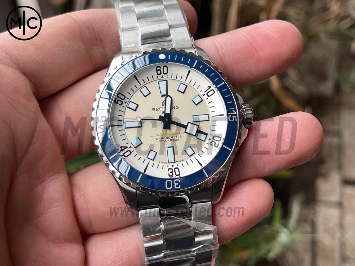 超級海洋系列自動腕錶 44mm 不鏽鋼藍色錶圈奶油色錶盤配不鏽鋼錶鏈 - 尊貴版